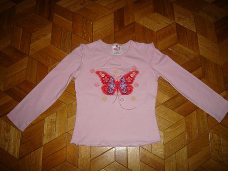 Motýlikové tričko, 104