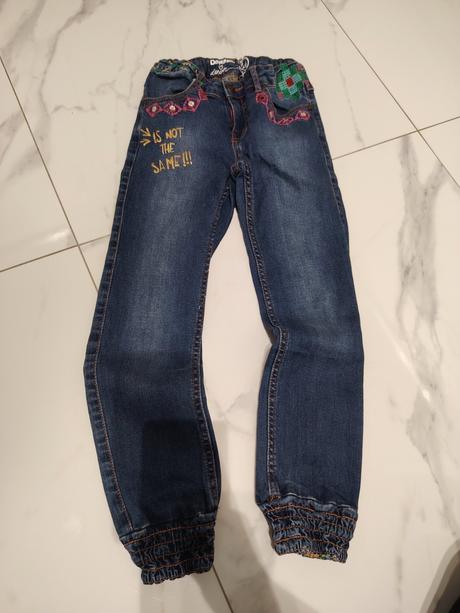 Rifle slim, desigual,122