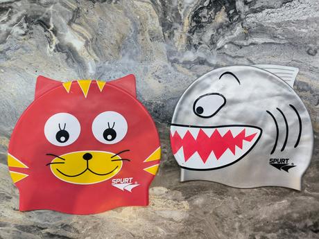 Nepoužívané silikónové plavecké čiapky po mojich d,