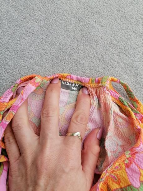 Nenosený overal destination, 146