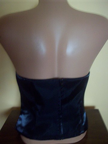 Lesklý korzet, 38