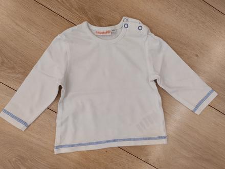 Nádherné tričko, 62