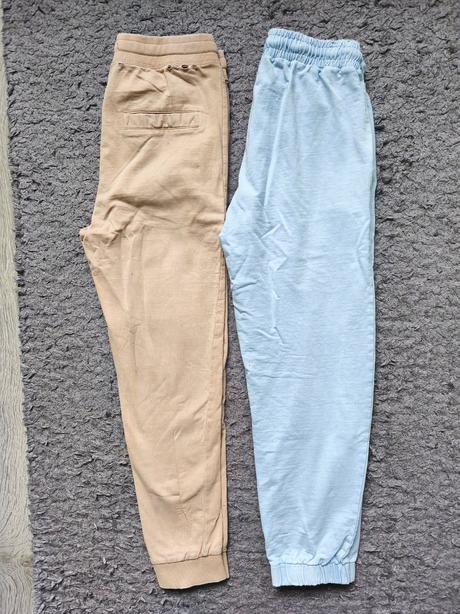 2x tepláky, reserved,152