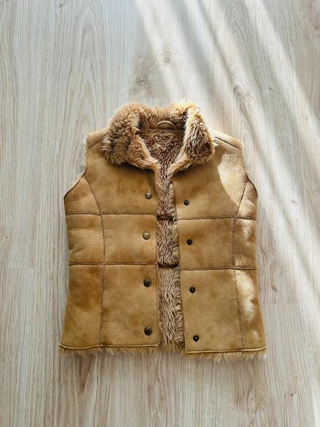 Skvelá kožušinková vesta značky marks & spencer, marks & spencer,116