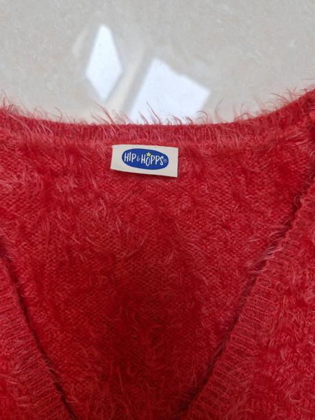 Chlpatý svetrik, 122