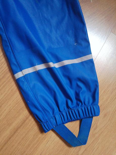 Nohavice do dažďa, lupilu,98