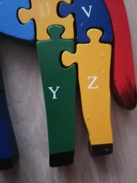 Drevené puzzle žirafa a motýľ, 