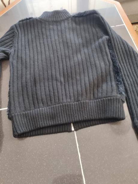 Teplý sveter, 158
