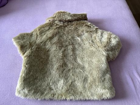 Bolerkova kožušinova vesta, 152