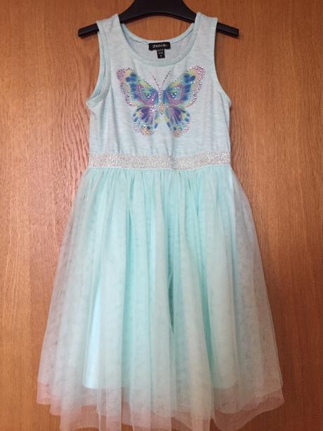 Šaty s motýľom, 122