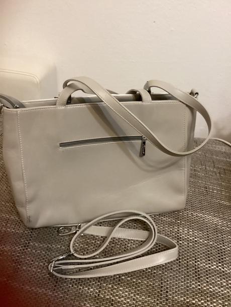 Taska s malým poškodením,