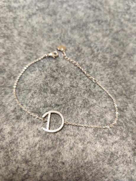 Clenkova retiazka s pismenom d, 