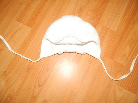 Teplejšia čiapka, 56