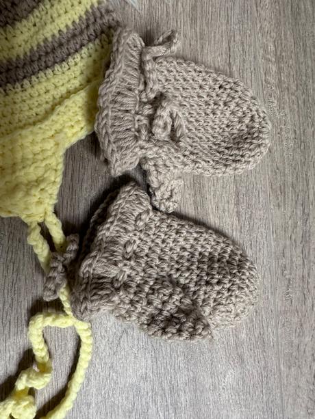 Čiapka a rukavičky, 68