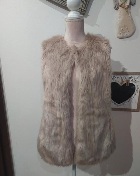 Kožušinova vesta, s