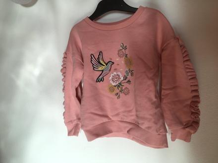 Svetríkov s volánikmi, primark,104
