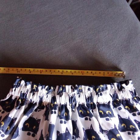 Sukňa s mačkami, 134