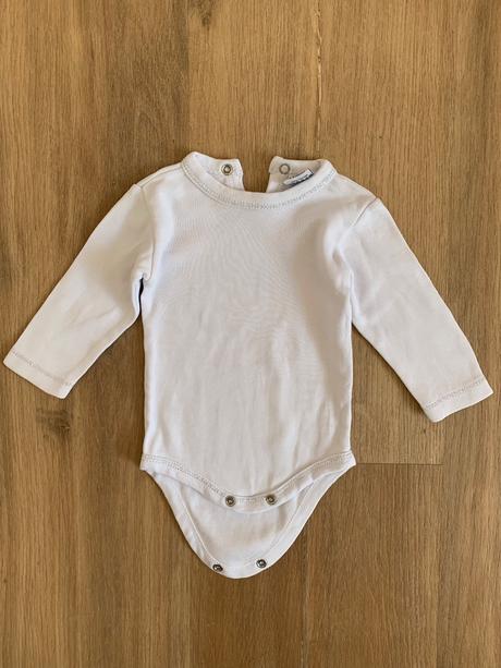 Biele body so strieborným lemom, 62