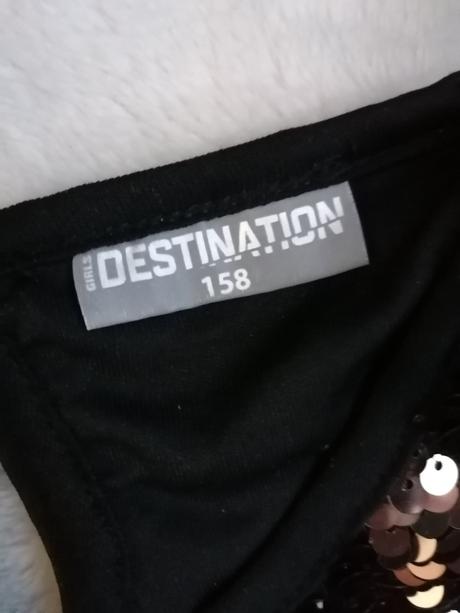 Šaty s otočnými flitrami, 158