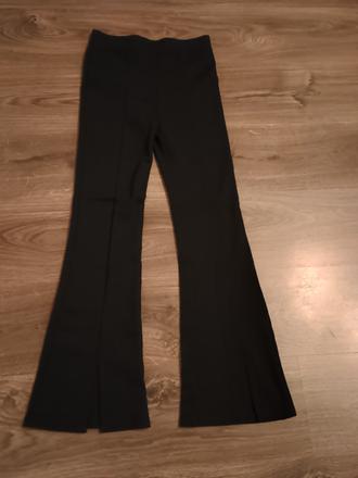 Rozšírené nohavice, 158