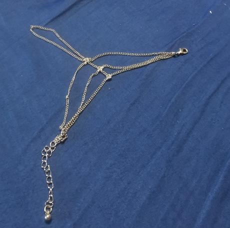 Retiazka na ruku cez prst, 