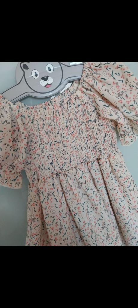 Kvetinové šaty, 110