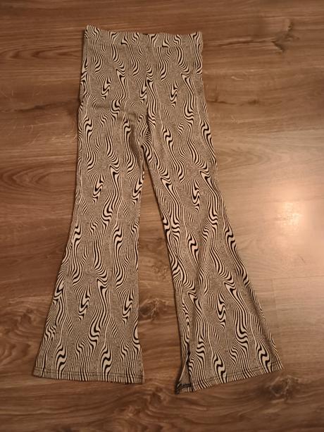 Rozšírené nohavice, 158