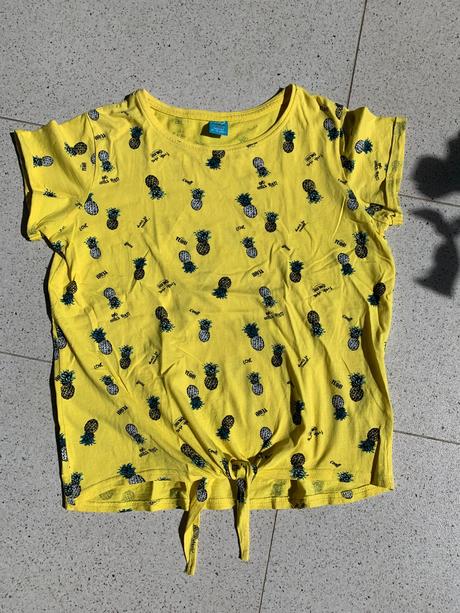 Tričko s ananásmi, 152