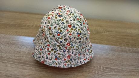 Klobúčik kvetinky, 98