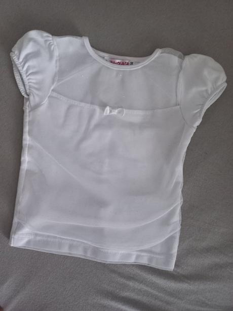 Sviatočné tričko, 98