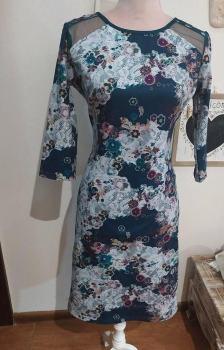 Kvetovane šaty, 38