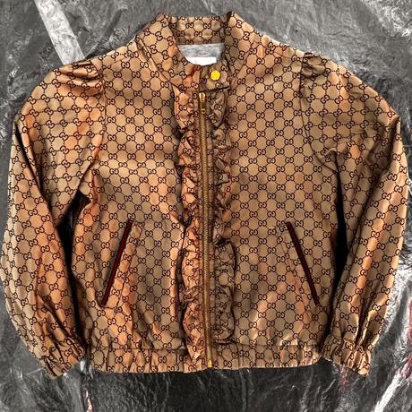 Gucci logo zlatá bunda s volánom a trikolórougucci, 104