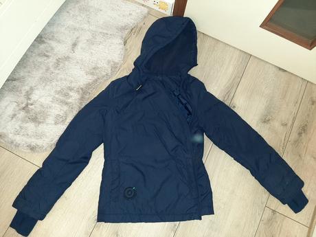 Bunda so šikmím zapínaním sublevel, s