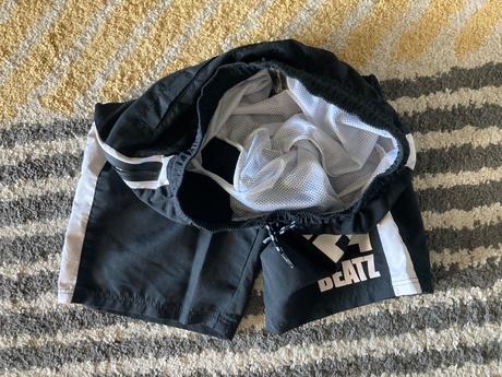 Plavky s nápisom 146/152, takko,146