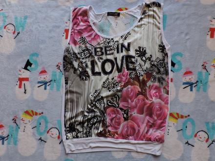 Voľná tunika s kvetmi,