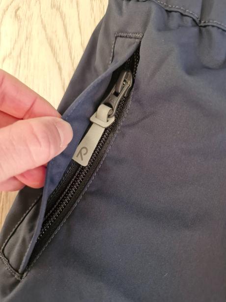 Nohavice do dažďa, reima,134