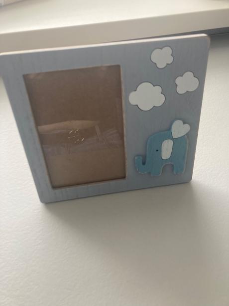 Drevený ramik na foto slonik,