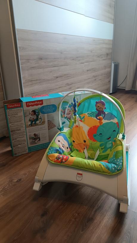 Vibračné kresielko a kolotoč fisher price, 