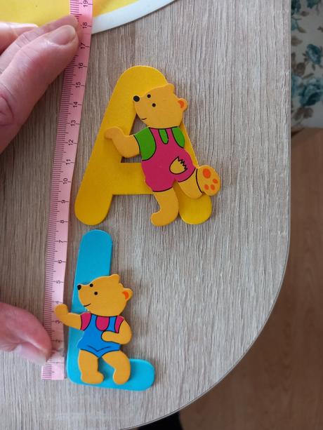 Drevené písmenká a a l,