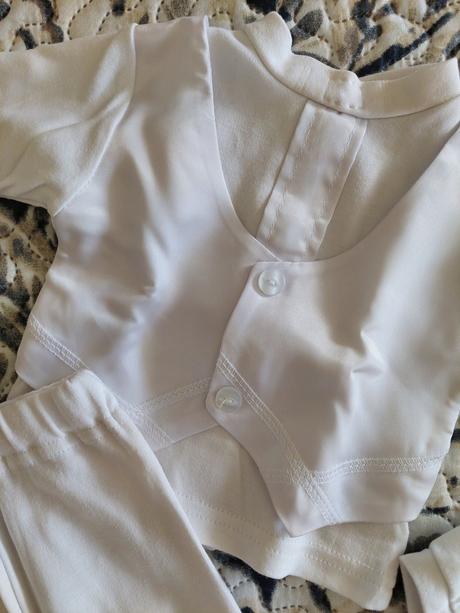 Oblečenie na krst, 56