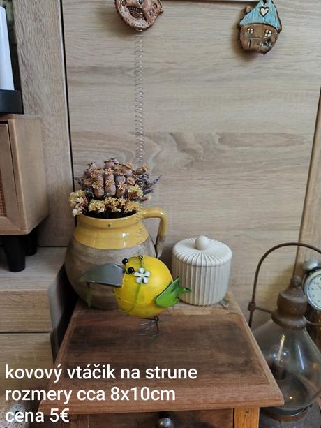 Kovový vtáčik na strune na zavesenie,