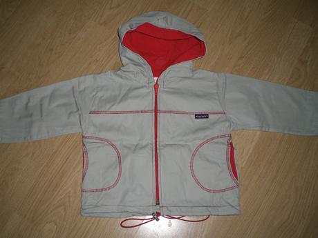 Šedočervená bundička, 92