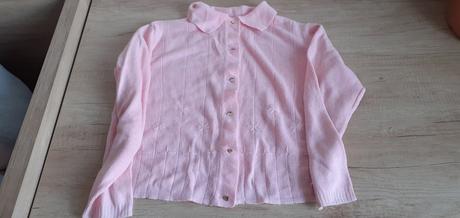 Ružový sveter, 128