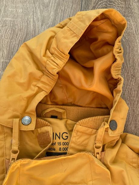 Kombinéza do dažďa, 92