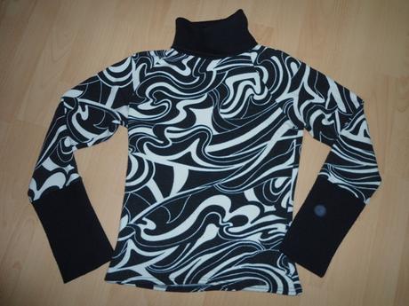 Ciernobiely rolak, s