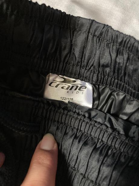 Crane nohavice do dažďa, 122