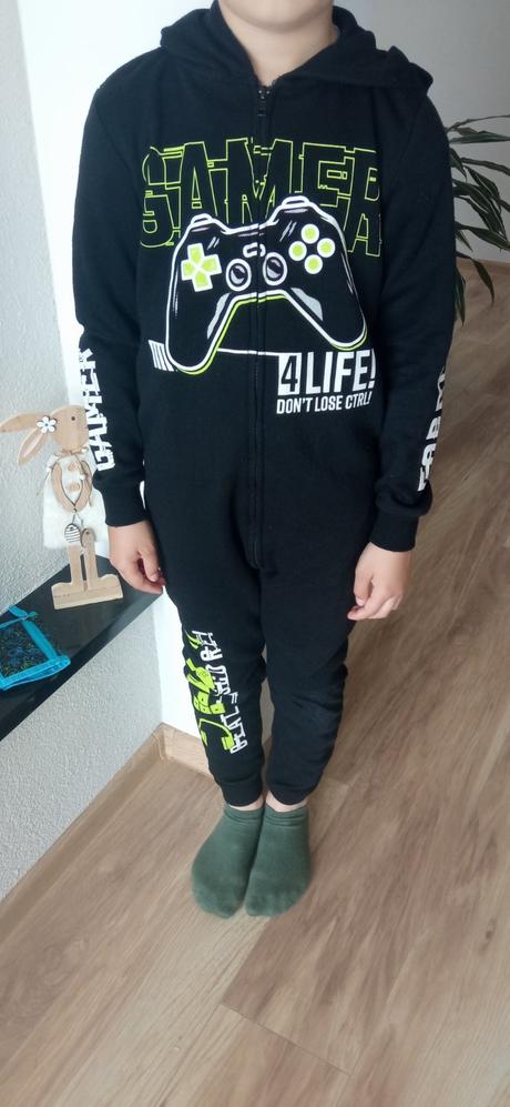 Teplákovy overal, 128