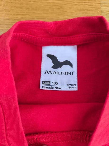 Obyčajné červené tričko, 134