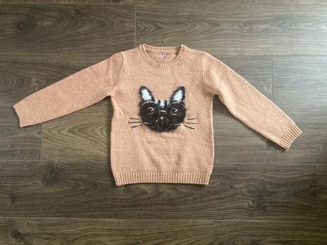 Sveter s mačkou, 134