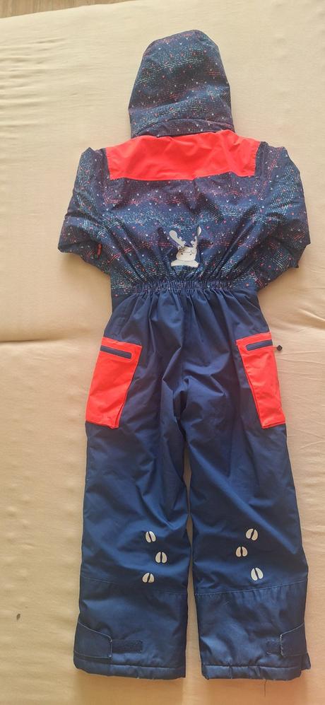 Kombinéza kilpi, 128